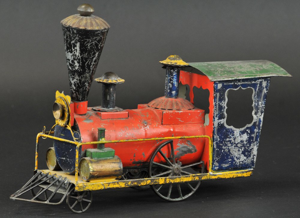 'OLD ABE' LOCOMOTIVE: George W. Brown, c. 1870, Early American tin, hand painted in red, blue, green, and black, very ornate example, classic long stack, scalloped windows. 13 3/4" l.