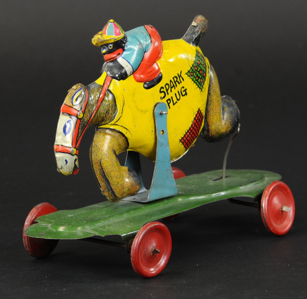 SUNSHINE RIDING SPARK PLUG PULL TOY: Litho tin pull toy probably made by J. Chein. This is one half of the racing toy sold separately. Chein also sold the other half as a separate toy. Original pull cord. When pulled simulates riding act