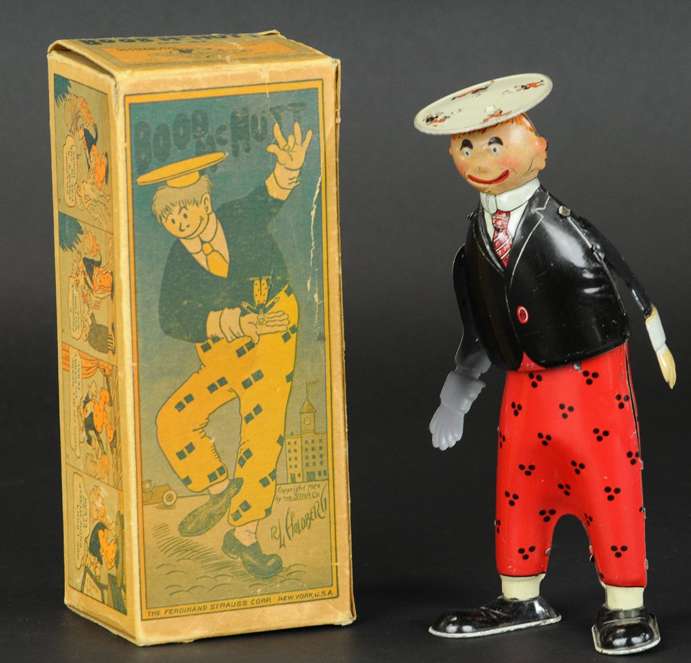 BOOB MCNUTT WALKING FIGURE WITH BOX: Ferdinand Strauss, lithographed tin, full figure, flat hat version, depicts the comic strip figure created by famed artist Rube Goldberg, key wind operated. 9" h.