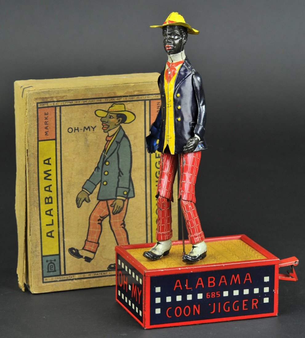 LEHMANN ALABAMA COON JIGGER WITH BOX: Germany, lithographed tin, classic dancing minstrel on base, colorful suited figure. 11" h.