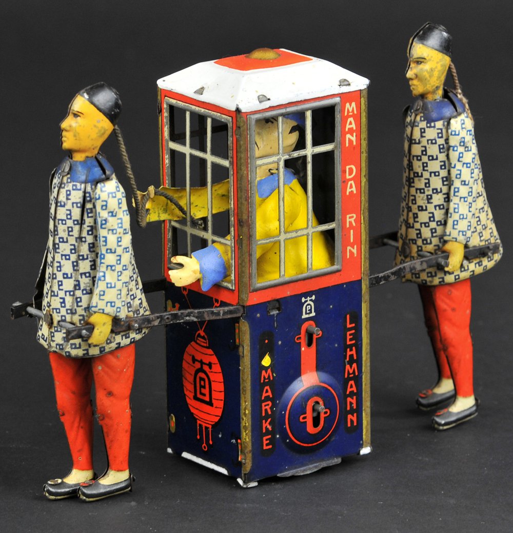 LEHMANN MAN-DA-RIN: Germany, hand painted coolies pulling seated Chinese official seated in sedan chair, clockwork activated. 7 1/2" long.