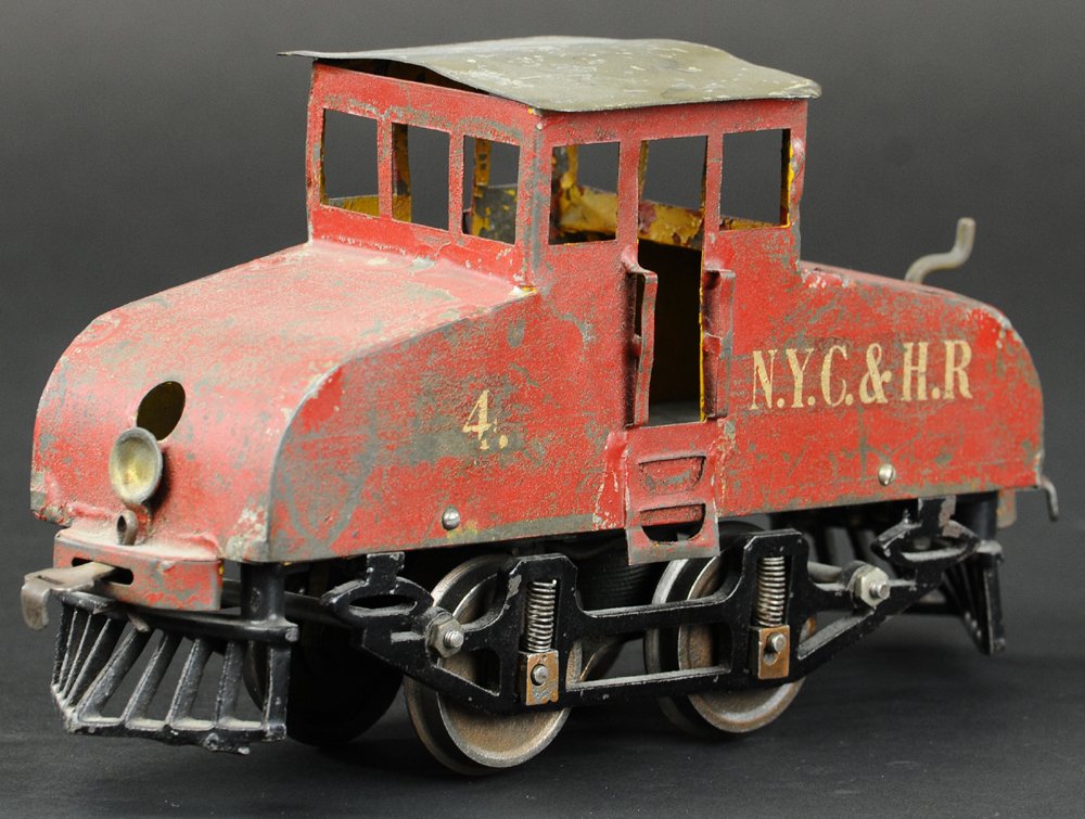 KNAPP 'NYC & HR' STEEPLE CAB LOCOMOTIVE GAUGE II: Painted in red body with rubber stamped sides, electric engine. 10 1/2" l.