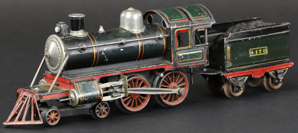 BUB LOCOMOTIVE & TENDER: Lithographed tin 4-4-0 steam outline clockwork driven locomotive with #4170 tin tender, both done in green body, red trim, loco has nickel plated dome and side rails. 13 1/4" overall length.