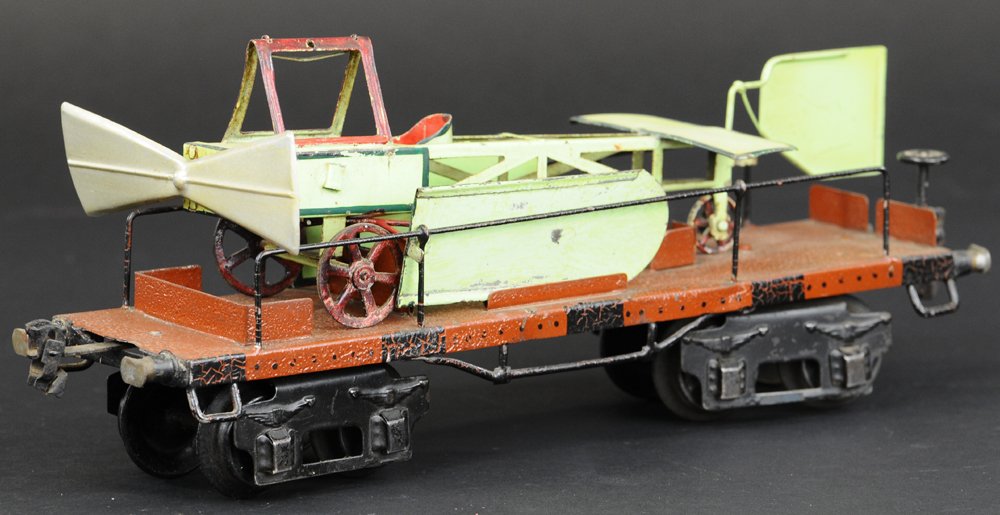 MARKLIN '1' GAUGE AIRPLANE FLAT CAR: Pre-war train car, scarce example, all original airplane with propeller, side wings and rear wing. 13" l.