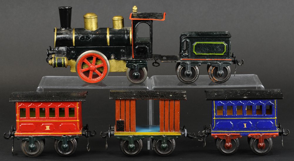 MARKLIN GAUGE '1' PASSENGER SET: An early European steam outline 0-4-0 clockwork locomotive painted in black with tin tender, together with #1803 Baggage car in brown, #1805 blue first class Passenger car, and #1805 red second class 