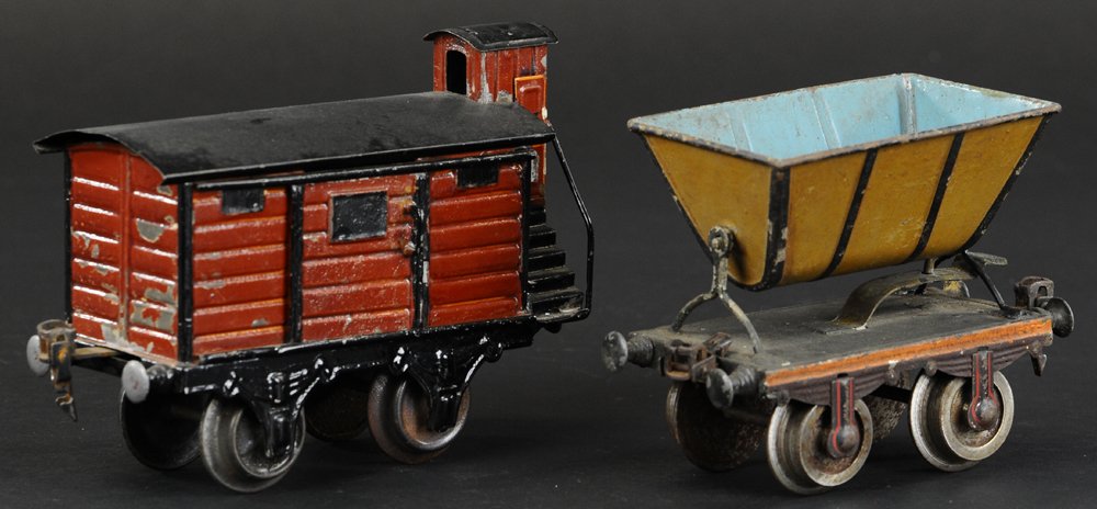 LOT OF TWO MARKLIN '1' GAUGE FREIGHT CARS: Germany, includes hand painted side dumping coal car, and box car with guard's house. 5" to 6 1/4" l.