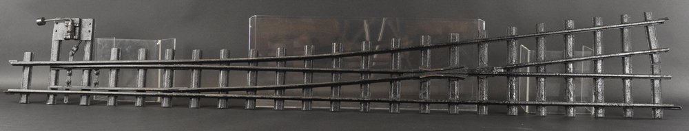BUDDY 'L' LEFT HAND SWITCH: All black pressed steel track with left hand switch. 6' 9" x 13" w.