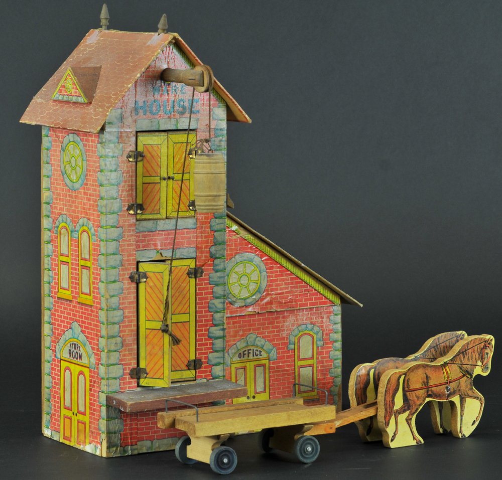 BLISS WAREHOUSE: Extremely rare R. Bliss lithographed paper on wood warehouse building, paper on cardboard peaked roof with side dormer and turned wood finials, features double doors on two levels and pulley for loadi
