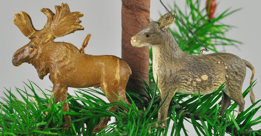 DRESDEN MOOSE AND DONKEY ORNAMENTS: Germany, two Dresden ornaments designed in the form of a brown moose with detailed antlers and a grey donkey, nice detailing. 2" l.