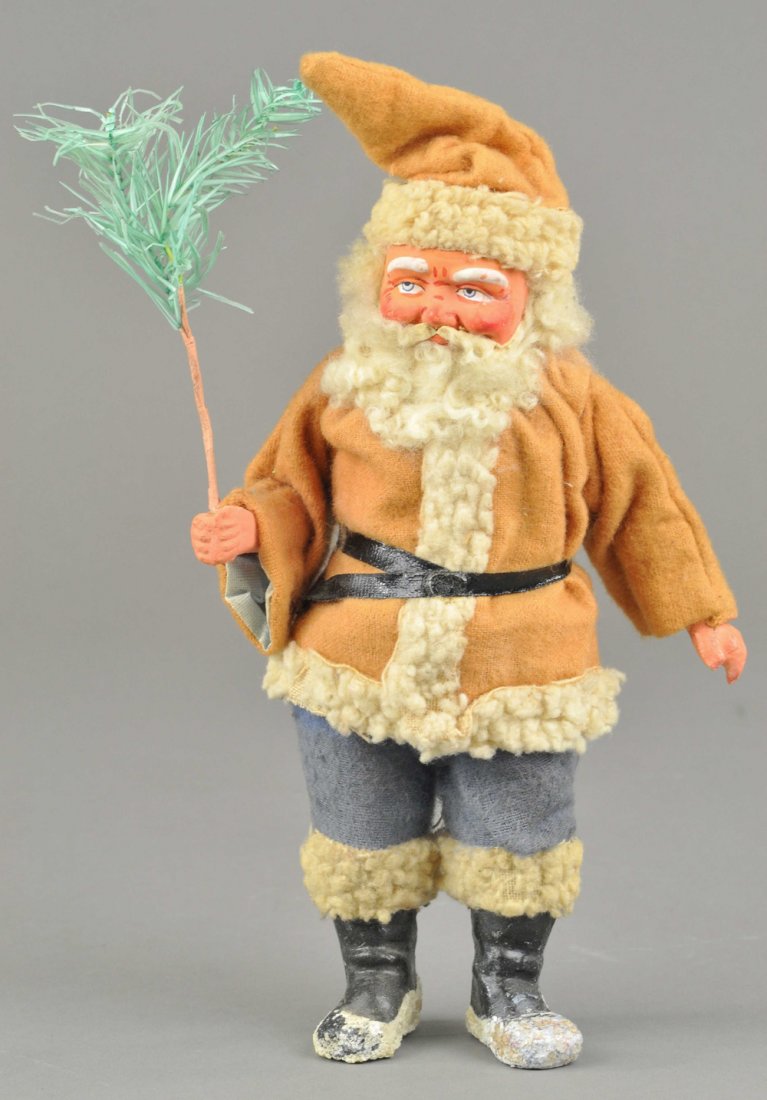 GERMAN SANTA CLAUS CANDY CONTAINER: Red robe with white trim Santa, blue trousers over black boots, composition hands and face. 9" l. Ex. Tom Fox Collection.