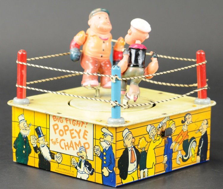 POPEYE THE CHAMP: Louis Marx, lithographed tin boxing ring, features tin posts, == and string ropes, depicts celluloid figures of Popeye and Brutus ready to swing away when clockwork is activated, very amusing toy. 7 1