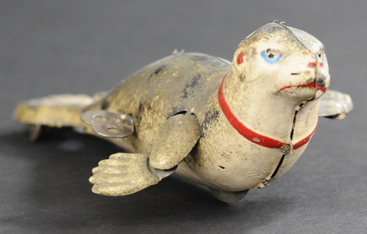 LEHMANN SEAL: Germany, lithographed tin, life like colors and scale, wind up action, a very popular toy. 7" l.