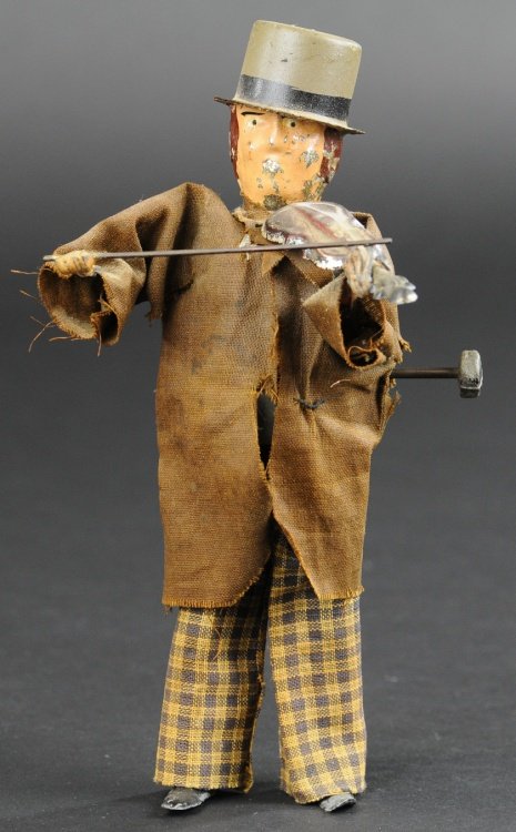 MARTIN VIOLINIST: France, c. 1896, cloth dressed, hand painted tin head, hat and violin, clockwork action, lead feet. 8 1/4" h.