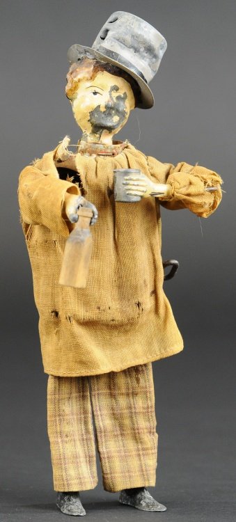 FERNAND MARTIN DRUNKARD: France, hand painted tin clockwork toy, cloth dressed figure holds wooden bottle and tin cup. 8" h.