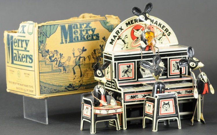 MERRY MAKERS BAND: Louis Marx, c. 1929, lithographed tin, marquee backdrop, four mice, two in band, one dancer, one seated atop piano with fiddle in hand, includes original box. 9" w x 8" h.