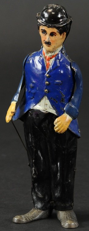 CHARLIE CHAPLIN WALKER: B&R, USA, lithographed tin Charlie Chaplin, toy has clockwork action, Charlie depicted in familiar outfit with top hat and cane in hand. 8 1/2" h.