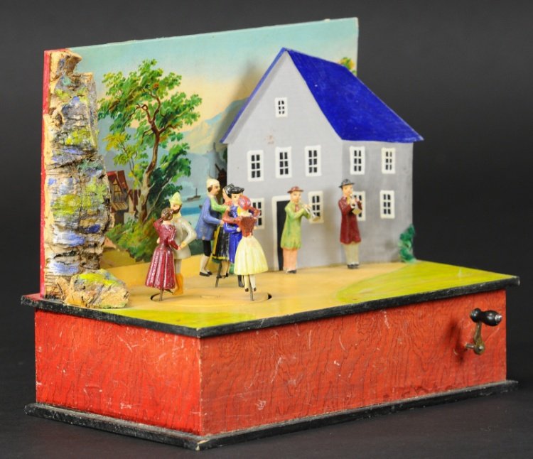 ERZGEBIRGE MUSIC BOX WITH DANCERS: Hand painted, charming early German village theme with dancing figures able to revolve on dance floor while other horn player figures are displayed and stand still, front crank activates spinning and