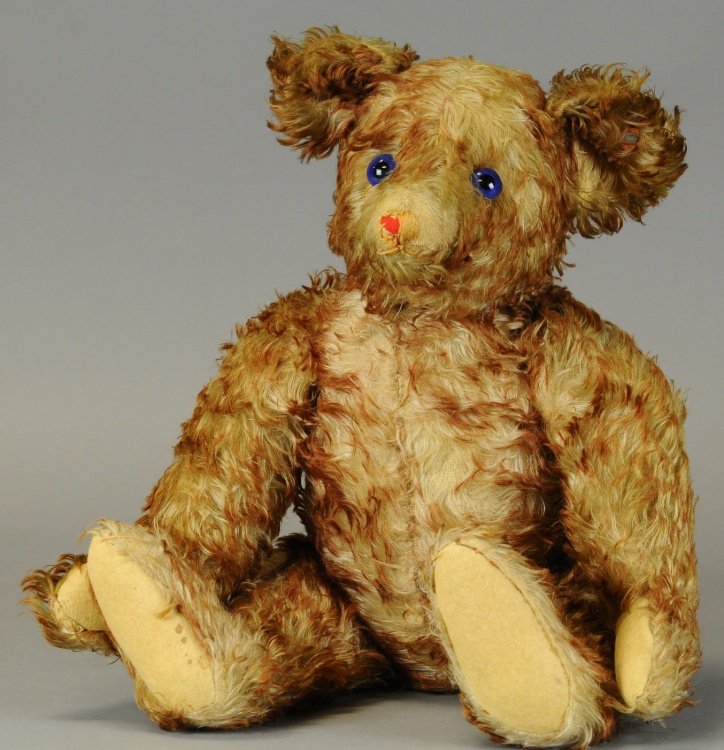 RARE STEIFF "PETSY" BEAR: Late 1920's Steiff bear w/tipped fur and violet blue glass eyes, underscored Steiff button in ear. 20" h.