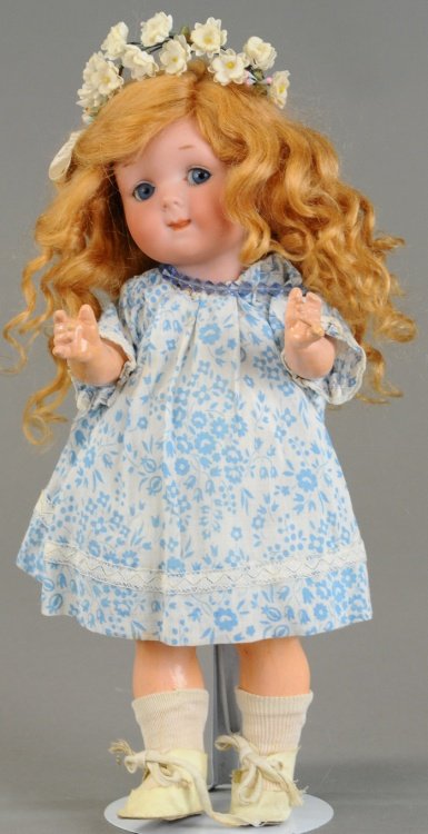GERMAN TODDLER GIRL: Larger than average example incised '200 A 3/0 M. Germany,' with blue side glancing sleep eyes on nice five piece toddler body with bare feet, wears period dress and replacement wig. 10 1/2" (27 cm).