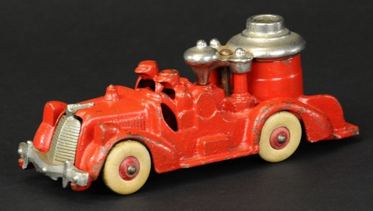HUBLEY FIRE TRUCK: Cast iron, painted in red overall, features nickel boiler top and grille, cast drivers, rubber tires. 6 1/4" l.
