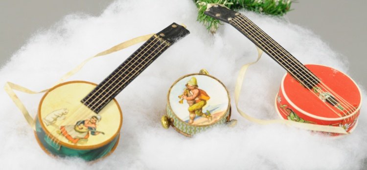THREE GERMAN DRESDEN MUSICAL INSTRUMENTS: Features two colorful banjos and tambourine Dresden candy containers. 1 1/2" to 5". Ex. Tom Fox Collection