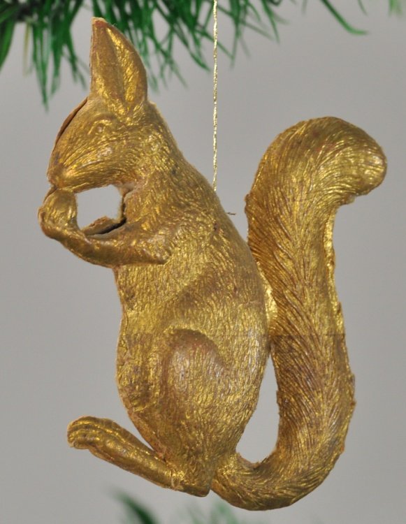 DRESDEN SQUIRREL: Upright squirrel eating a nut, nice gold coloring. 2 1/2" x 3". Ex. Tom Fox Collection