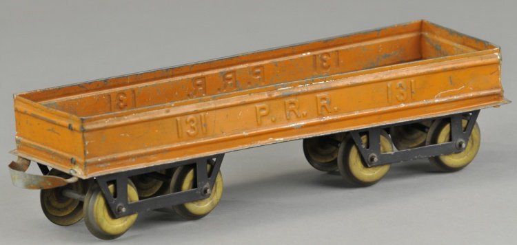 CARLISLE & FINCH No. 90 GONDOLA: c. 1911-1915, 12" mid size freight car in orange painted sheet metal, brass wheel trucks embossed 131 and PRR, difficult to find in this size. 13" l.