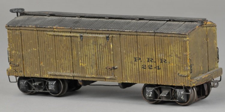 BOX CAR: Wood construction, painted olive with black roof, marked PRR and 224, heavy steel arch bar trucks, part of several sets made for the 1926 Pennsylvania Railroad display at the Susquehanna Tri-Centennia