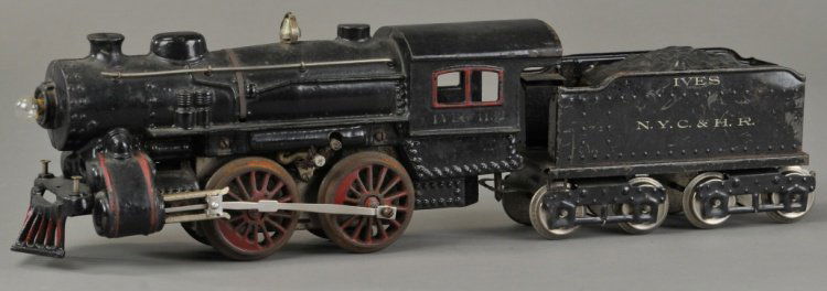 IVES #1132 STEAM LOCO AND #40 TENDER: Ives pre-war wide gauge #1132 black 0-4-0 steam loco with #40 NYC & RR tender, loco has cast iron boiler with boiler bands and red window trim, tender is stamped IVES NYC & HR. Loco 12" l.