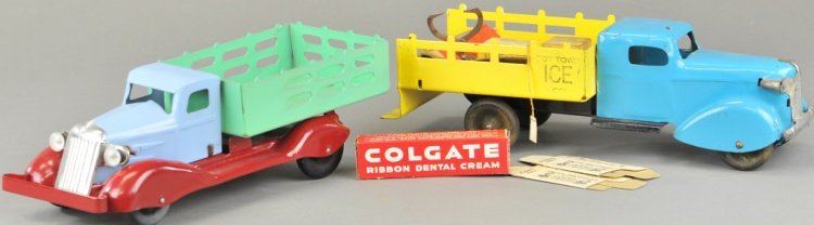 WYANDOTTE DELIVERY TRUCKS: Both pressed steel, includes an ice truck in yellow and blue with ice and tongs and an electric light stake side truck in green, blue and red, great colors, plated grilles, wooden wheels. 10" l.