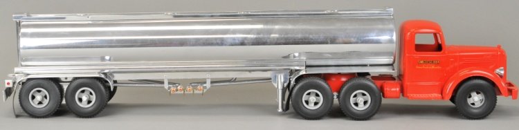 L MACK TRACTOR W/FUEL TANKER: Custom made example, Smith Miller cab with trailer marked 2001, red die cast tractor pulls long aluminum tank body with rubber tires.