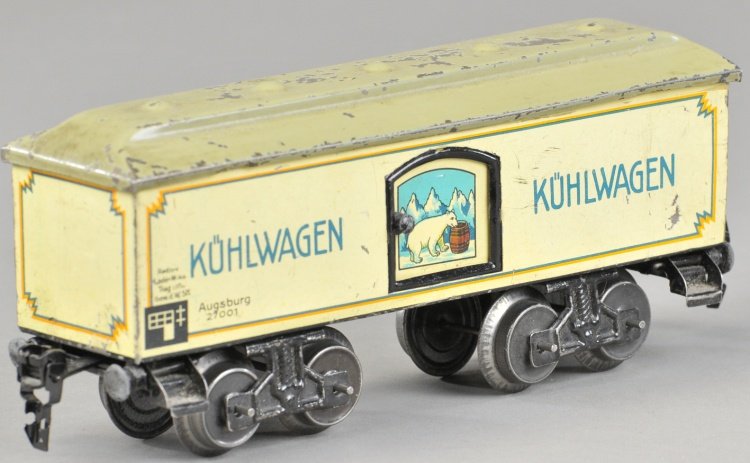 KARL BUB KUHLWAGON REEFERE CAR: Pre-war O gauge lithographed tin refrigerator box car with painted roof, eight wheels and sliding doors. 8" l.