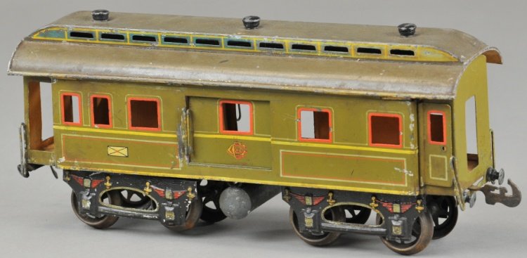 CARETTE I GAUGE MAIL CAR: Germany, hand painted in green body with tan interior, roof lifts to reveal two rooms and small chair, sides contain envelope graphics, opening end doors. 11" l.