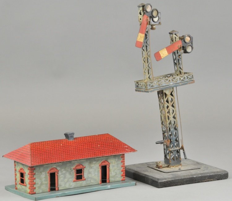 BING SEMAPHORE & STATION: Two German train accessories, station done in lithographed tin, double semaphore has hand levers and electric outfit on base. Station 9 1/2" x 5", Semaphore 14" h.