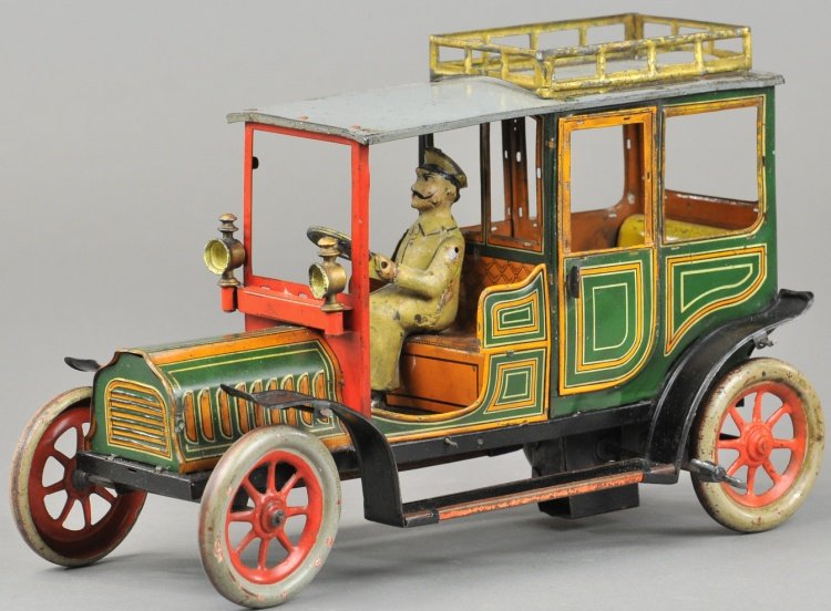 HANS EBERL LIMOUSINE: Germany, c. 1915, lithographed tin, luxury tin auto example features full running boards, opening doors, luggage rack, front mounted side lanterns, colorful graphic body striping, seated driver and cl
