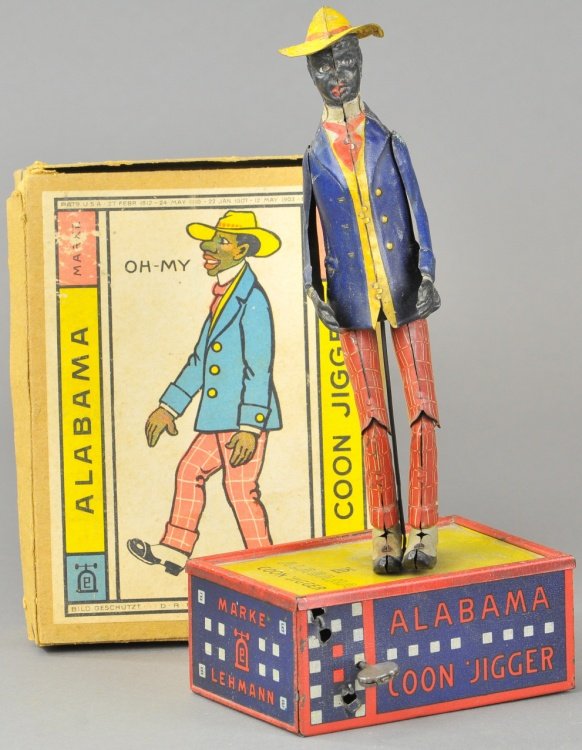OH MY ALABAMA JIGGER W/BOX: Lehmann, lithographed tin, dancing figure on tin dance floor base, very colorful, clockwork activated dance motions, original box. 10" h.