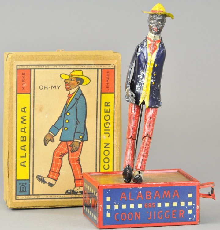 LEHMANN ALABAMA COON JIGGER W/BOX: Germany, lithographed tin, classic dancing minstrel on base, colorful suited figure. 11" h.