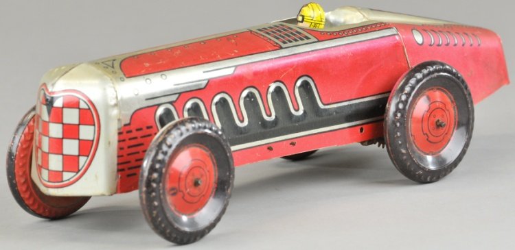 MARX MECHANICAL SPEED RACER: Lithographed tin toy racer, wind up action, done in red and silver, seated driver. 13" l.