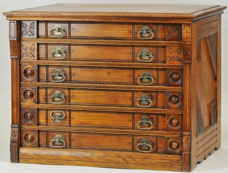SIX DRAWER WILLIMANTIC SPOOL CABINET: Refinished oak Willimantic spool cotton cabinet, Eastlake style with end post and the Willimantic spool cotton owl on the back of the case, complete with the bronze advertising drawer pulls. 20" h x 2