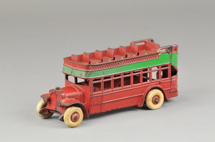 KENTON CITY BUS: Large double decker bus, done in red body, green band on side, gold trimmed, features upper deck open seating, rear stairway, rubber tires. 9 1/2" l.