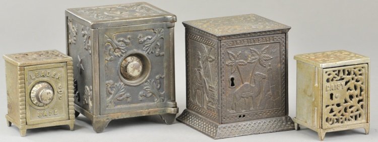 GROUPING OF SAFE BANKS: Cast iron lot includes the Leader, Daisy, Moon and Stars, and an Arabian Safe example.