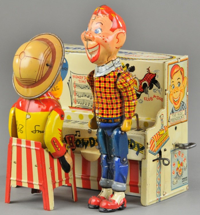HOWDY DOODY BAND: Unique Art, colorful tin lithographed band toy, features Bob Smith at the piano and Howdy Doody dancing figure. 5" l.