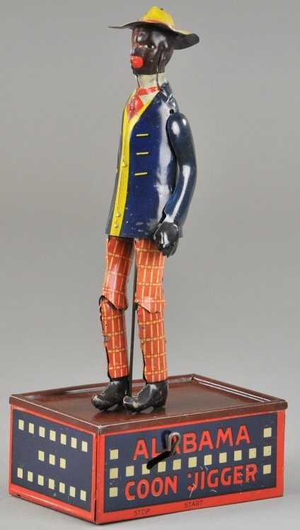 STRAUSS "TOMBO" ALABAMA COON JIGGER: Ferdinand Strauss, c. 1920's, lithographed tin wind up toy, classic action depicting dancing figure, bright colors overall. 10 1/4" h.
