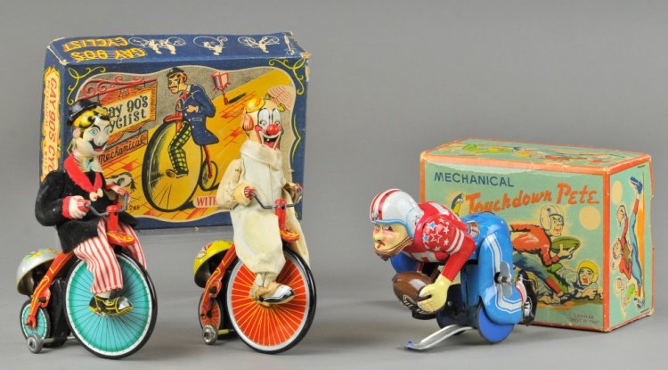 CYCLIST & FOOTBALL PLAYER TOYS: Japan, TPS and Linemar, both lithographed tin, features wind up Gay 90's Cyclist Clown with box and wind up Football Player holding ball with original box. 4 1/2" to 6 1/2" h.
