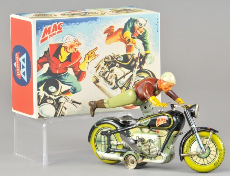 MAC MOTORCYCLE W/ BOX: Arnold, Germany, lithographed tin, amusing clockwork action allows dismount action, black cycle version. 8" l.