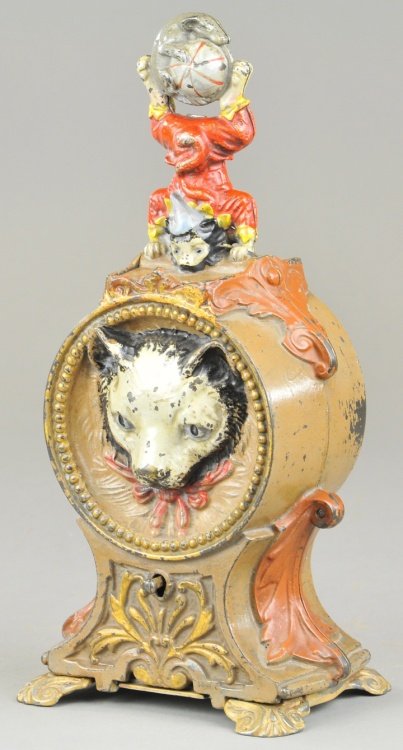 CAT & MOUSE MECHANICAL BANK: J & E Stevens Co., designed by James H. Bowen, patented 4/21/1891. Place a coin in front of the mouse over the cat. Press the lever, and as the coin disappears into the bank, the kitten, in fancy dres