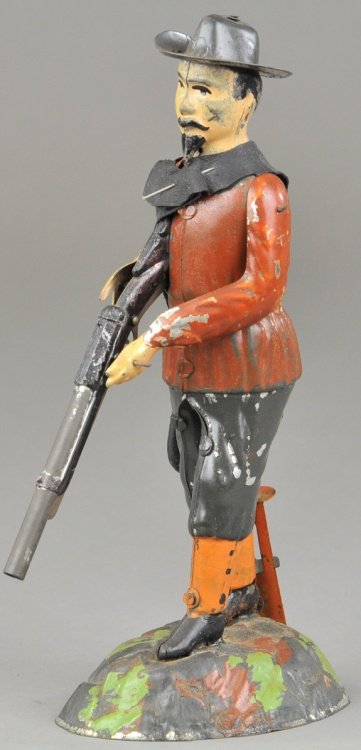 BUFFALO BILL TARGET SHOOTER: Gunthermann, Germany, hand painted tin, depicts famed Buffalo Bill with rifle in hand, lever action, originally sold as "Le Champion." 9" h.