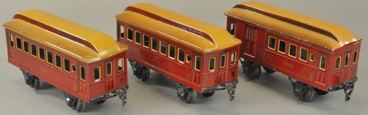MARKLIN PENNSYLVANIA CARS: Germany, includes two prewar '1' gauge #2942 Pennsylvania Railroad simulated wood-sided passenger cars and #2943 Combine, all in matching body and roof colors. 8 1/2" l.