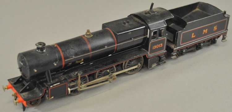BASSETT LOWKE 'O' GAUGE LOCOMOTIVE 2-6-0: Impressively scaled #13013 locomotive and six wheel tender marked "LMS," done in black overall. Loco 11 1/2" l.