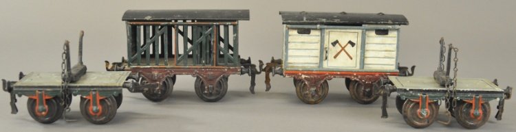 MARKLIN '1' GAUGE TRAIN CAR GROUPING: Germany, lot includes log car in two sections, stock car with sliding doors, and box car with sickle emblems on sides, all hand painted, varied colors. 5" l.